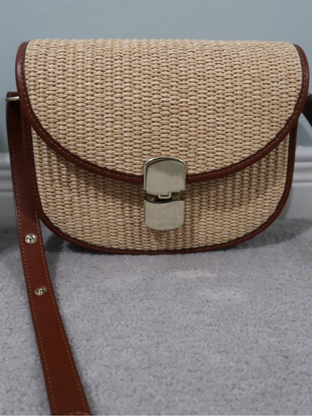 Sézane Woven Straw Crossbody Bag with Brown Trim. Custom A embossed on the back